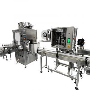 Automated capping machine sealing a bottle.